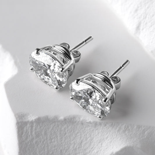 Oval diamond stud earrings side