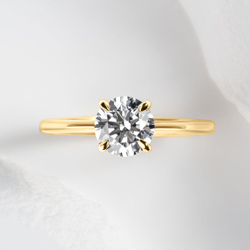 Yellow gold round diamond ring