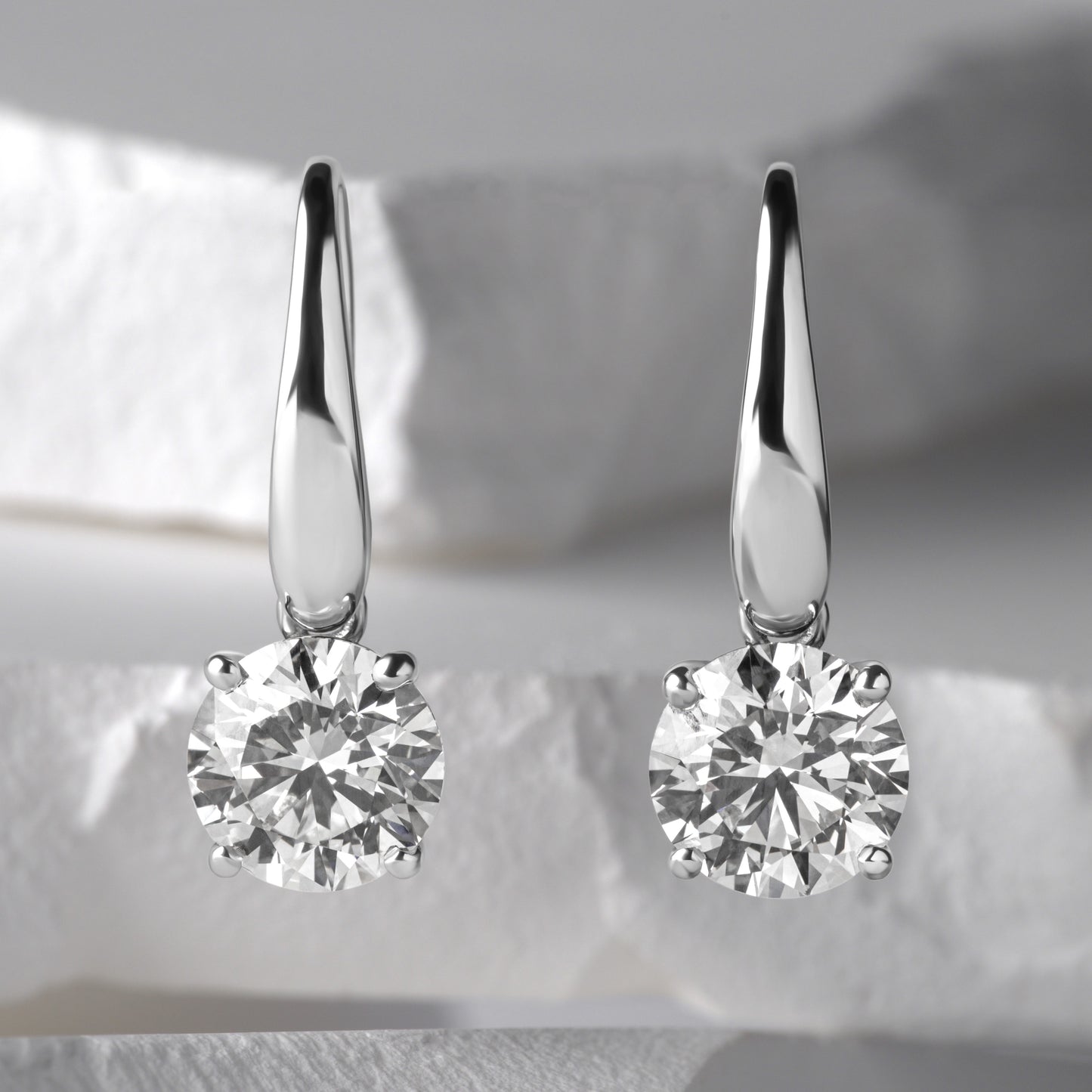 white gold round brilliant drop earrings