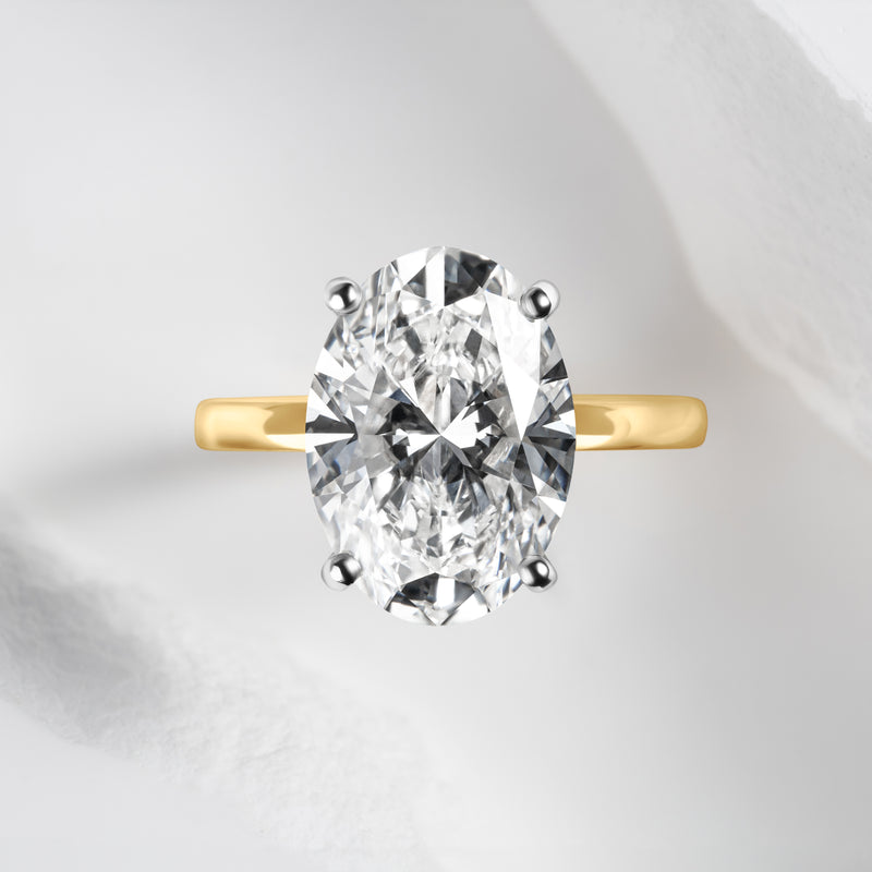 yellow gold oval diamond ring