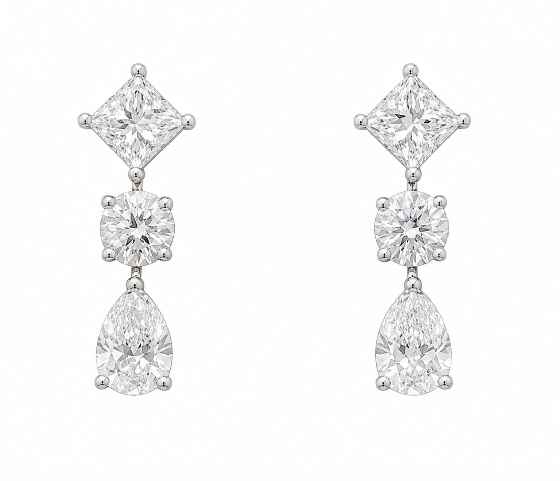 Diamond earrings with pear, princess and round brilliant lab grown diamonds. 