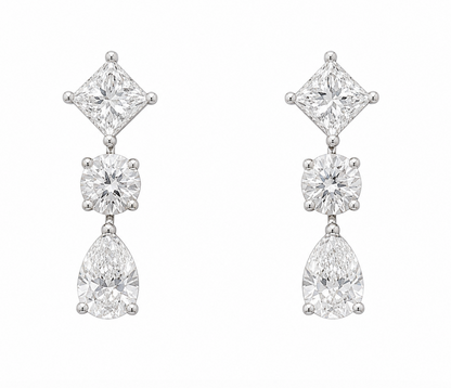 Diamond earrings with pear, princess and round brilliant lab grown diamonds. 