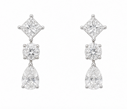 Diamond earrings with pear, princess and round brilliant lab grown diamonds. 
