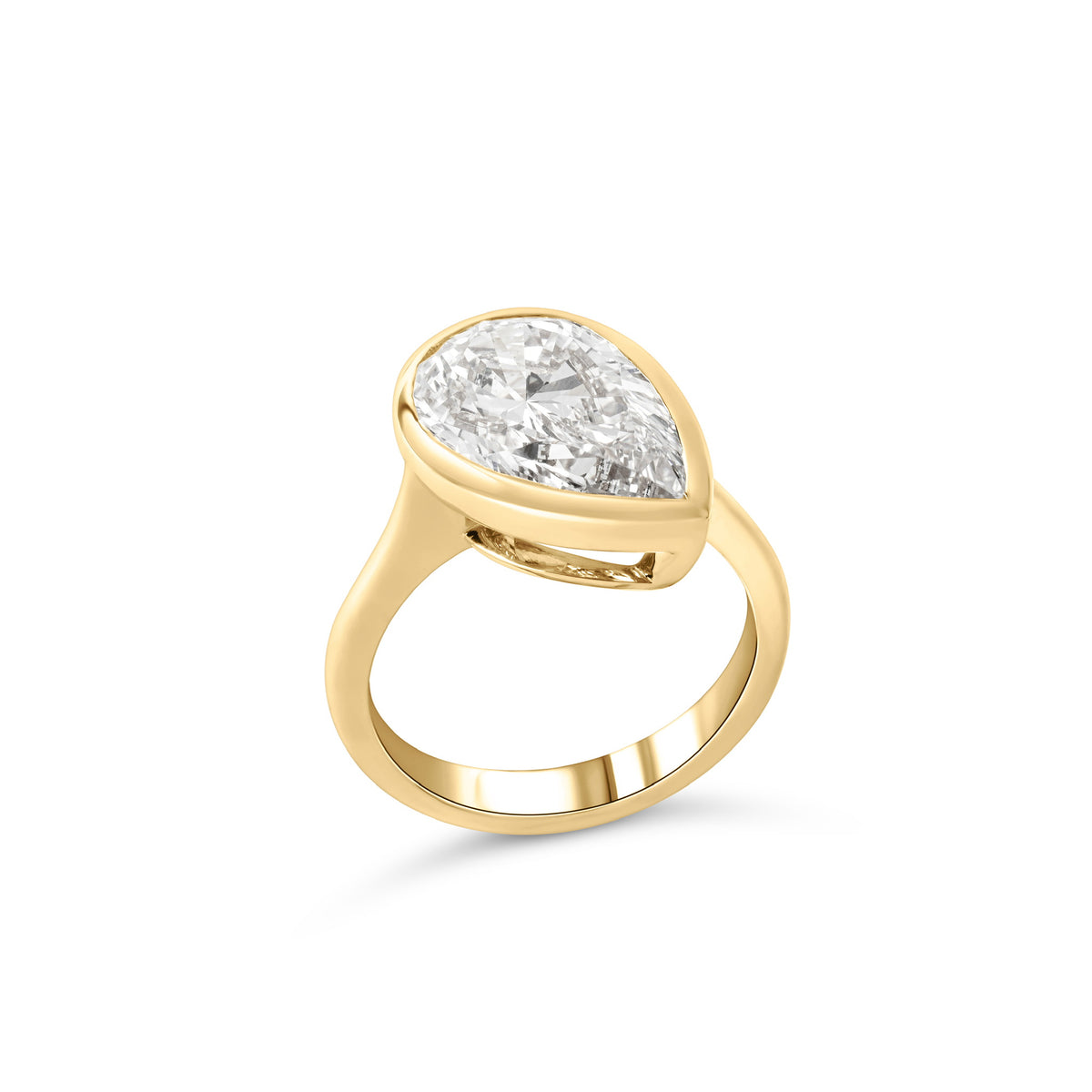 18k Yellow Gold Ring with an Offset Pear Cut Laboratory Grown Diamond