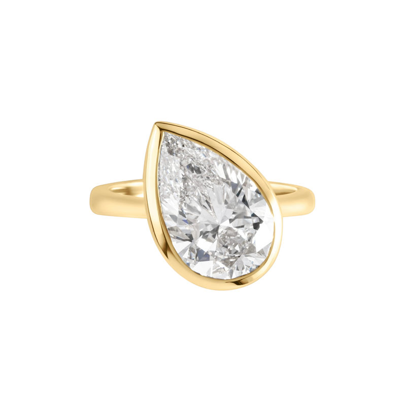 18k Yellow Gold Ring with an Offset Pear Cut Laboratory Grown Diamond